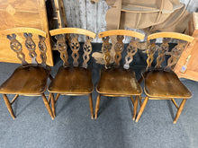 Load image into Gallery viewer, A classic set of four Ercol Blue Label Plume of Feathers dining chairs, each in solid working order. These vintage pieces show their age with minor surface marks and patina, but remain structurally sound and ready for everyday use. Perfect for those seeking authentic mid-century character without restoration work.

Delivery Available

Overall Dimensions

approx : 41cm wide x 42.5cm deep x 78.5cm high&nbsp;

