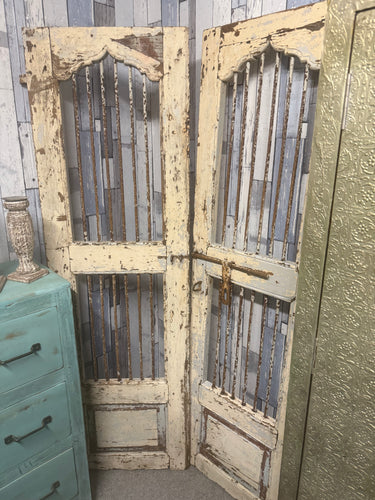 Add a touch of Indian heritage to your home with these magnificent yellow jali doors. Imported with care and built to endure, these pieces blend traditional artistry with practical strength. Perfect as versatile room separators, enchanting garden gates, or standalone design statements, they bring authentic character and visual interest to any space.

Overall Dimensions

each door measures : 49cm wide x 160.5cm high

DELIVERY AVAILABLE      

For our other items see our website https://fossewayfurniture.co.u