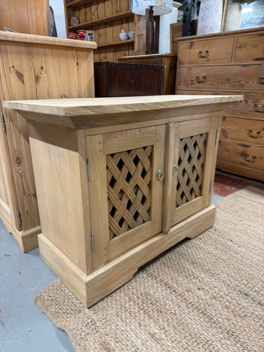 This beautiful hardwood TV unit has been lovingly stripped back to its natural finish, giving it a fresh, authentic look full of character. To keep it looking its best, applying a coat of wax is recommended, which will also help protect the wood. Inside, there’s a convenient shelf that offers extra storage space for your media devices or accessories. Perfect for brightening up your living room with timeless style and practical functionality.

Delivery Available

Overall Dimensions

87cm wide x 42.5cm deep x