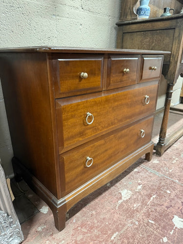 This beautiful stag chest of drawers is solidly built and in generally good shape. While it shows some signs of use, the marks are minor. It features three short dovetail-jointed drawers above two longer ones, providing ample storage space.

Delivery Available

Overall Dimensions

82cm wide x 46cm deep x 72cm high
