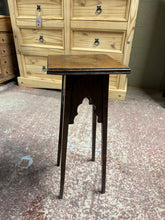 Load image into Gallery viewer, This elegant mahogany plant stand combines timeless style with practical functionality. Structurally sound and in good condition, it bears only minor cosmetic marks that add character without compromising its appeal. The sturdy construction provides a perfect perch for displaying your favourite plants, bringing height and visual interest to any living room. A versatile piece that elevates both your greenery and your interior décor.

Delivery Available

Overall Dimensions

25cm wide x 25cm deep x 63cm high

