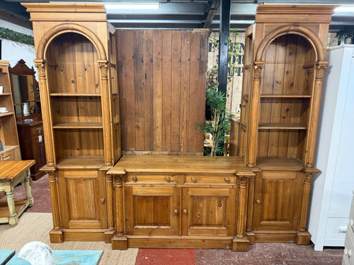 This beautiful solid pine dresser / entertainment unit is sturdy and generally in great shape. While it has a few minor marks, they’re hardly noticeable. It offers plenty of storage space with 4 shelves, 4 cupboards, and 2 drawers. There is some slight damage, such as a cracked knob and a bit of missing detailing, but nothing that stands out. Plus, it breaks down into three parts, making it easier to move.

Overall Dimensions

247cm wide x 50cm deep x 211cm high

DELIVERY AVAILABLE      

For our other item