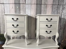 Load image into Gallery viewer, This charming pair of French-style bedside tables are both sturdy and well-maintained. While they show some minor signs of wear, nothing is too noticeable. Each bedside features three compact drawers, perfect for keeping your essentials close at hand.

Delivery Available

Overall Dimensions

48cm wide x 35cm deep x 65.5cm high&nbsp; &nbsp; &nbsp;

