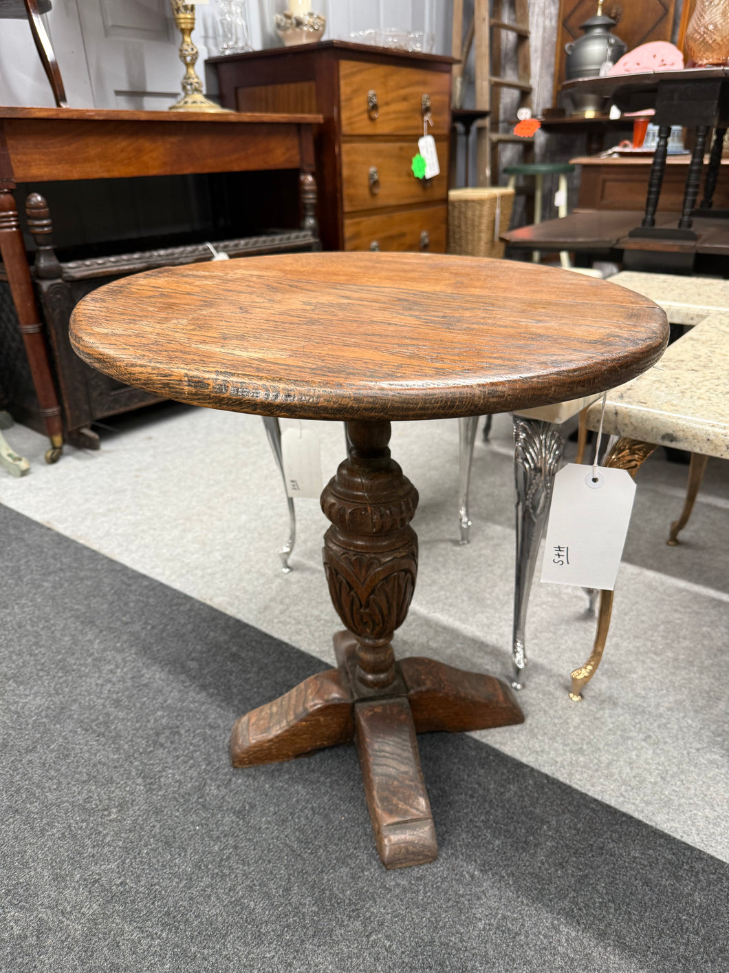 This charming early 20th century oak side table combines timeless elegance with sturdy craftsmanship. Perfect for holding your favourite lamp, books, or tea, this side table brings both style and function to your living space. 

Delivery Available

Overall Dimensions

49cm diameter x 52cm high

Split the cost over 3 months with KLARNA when you spend £50 or more          


All our items are second hand so may have a few marks,knocks ,chips etc that aren't clearly seen in the ph