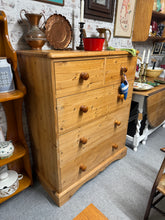 Load image into Gallery viewer, This charming solid pine chest of drawers offers plenty of storage space with two smaller dovetail jointed drawers above three larger ones. It’s pre-owned and shows some minor marks, but nothing significant at all.

Delivery Available

Overall Dimensions

92cm wide x 43cm deep x 112cm high&nbsp;


