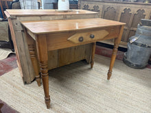 Load image into Gallery viewer, This Victorian Pine Hall Table is a sturdy, functional piece with authentic period appeal. Built solidly and performing reliably, it shows the natural signs of use through surface marks—but nothing that detracts from its usability or charm. It does have bowed back legs but this does not affect its use. A front drawer provides practical storage.

Delivery Available

Overall Dimensions

92cm wide x 42.5cm deep x 71cm high

