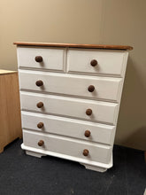 Load image into Gallery viewer, A sturdy pine chest with practical drawer configuration—two short drawers above four long ones. Structurally robust and fully operational, this piece carries the honest marks of everyday use without any functional compromise. Surface marks and wear are consistent with its age, yet a good repaint would easily restore it to pristine condition.&nbsp;

Delivery Available

Overall Dimensions

87cm wide x 44cm deep x 102cm high&nbsp;&nbsp;

