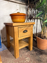 Load image into Gallery viewer, Oak side table with timeless appeal. Structurally sound and well-used, featuring marks that enhance its character. Single dovetail-jointed drawer and lower shelf provide practical storage in a compact footprint. Ideal for bedside, living room, or entryway use.

Delivery Available

Overall Dimensions

36cm wide x 40cm deep x 47cm high

