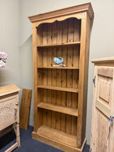Load image into Gallery viewer, A characterful vintage pine bookcase with genuine patina and honest wear. Four spacious shelves offer flexible storage for books, décor, and collections. Structurally sound and ready to bring warmth and character to any room. Perfect for those who appreciate authentic vintage pieces with history.

Delivery Available

Overall Dimensions

85cm wide x 30cm deep x 182.5cm high

