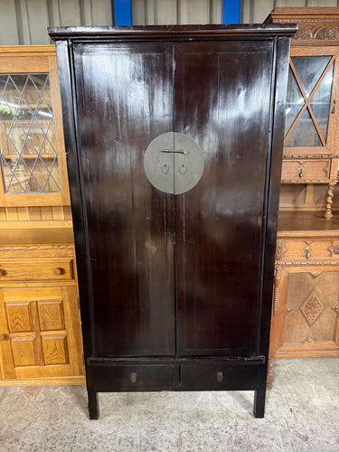 This beautiful Tibetan style wardrobe is structrually sound and generally well maintained. It shows some signs of use, including a few marks and a small hole on the back, but nothing too serious. Featuring one hanging rail and two drawers, it offers practical storage with charming character.

Overall Dimensions

99cm wide x 56cm deep x 191cm high

DELIVERY AVAILABLE      

For our other items see our website https://fossewayfurniture.co.uk

collection from our shop at CV36 4QZ or purchase online for deliver