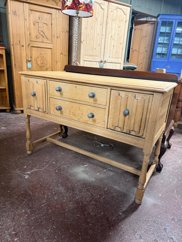 This beautiful oak desk / console table has been carefully stripped and re-waxed, removing its previous dark finish. It offers plenty of storage with two long dovetail-jointed drawers and two deep ones. While it has a few minor marks, they don’t detract from its charming character.

Delivery Available

Overall Dimensions

114.5cm wide x 50cm deep x 76.5cm high 

