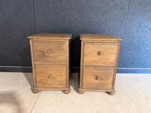 Load image into Gallery viewer, A charming pair of solid oak bedside tables, both in sound structural condition and ready for use. Each features two dovetail-jointed drawers offering practical storage for bedside essentials. One unit shows cosmetic marks on a side panel, but these do not affect functionality or stability. Ideal for adding warmth and character to a bedroom.

Delivery Available

Overall Dimensions

38cm wide x 46cm deep x 59cm high

