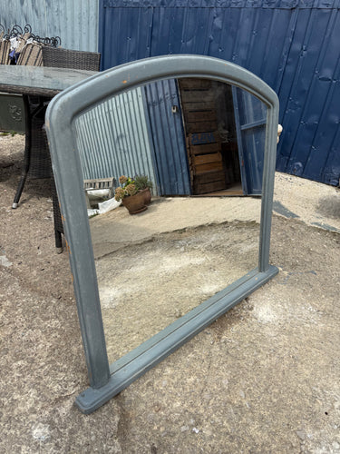 This charming wooden over mantle mirror has been painted grey by its previous owners and shows some wear that could use a little refreshing. A fresh coat of paint would really enhance its look, making it a lovely addition above your mantle.

Delivery Available

Overall Dimensions

110cm wide x 96cm high
