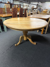 Load image into Gallery viewer, This charming round dining table, crafted from solid hardwood, remains sturdy and well-maintained. It shows only a handful of minor blemishes, which don’t affect its overall quality. Designed to comfortably accommodate 4 to 6 people, it’s perfect for enjoying meals and gatherings with family and friends.

Overall Dimensions

120cm diameter x 77cm high

DELIVERY AVAILABLE      

For our other items see our website https://fossewayfurniture.co.uk

collection from our shop at CV36 4QZ or purchase online for de
