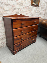 Load image into Gallery viewer, A well-maintained pine chest of drawers featuring four spacious drawers ideal for bedroom or living room storage. This piece shows honest signs of age with minor surface marks, but remains sturdy and fully functional. The solid construction ensures reliable everyday use for years to come.

Delivery Available

Overall Dimensions

82cm wide x 42cm deep x 75cm to the top of the unit

