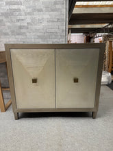 Load image into Gallery viewer, Elevate your interior with this distinctive geometric sideboard—a robust, well-maintained piece that delivers both style and substance. The pristine bevelled-glass surface showcases your finest décor, whilst the generous double cupboard with shelf provides essential storage solutions. This pre-owned item has only minor cosmetic imperfections that don&#39;t compromise functionality.&nbsp;

Delivery Available

Overall Dimensions

106cm wide x 40.5cm deep x 92.5cm high&nbsp; &nbsp;

