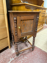 Load image into Gallery viewer, This beautiful oak pot cupboard is sturdy and well-maintained. While it shows some signs of use, the marks are minor and do not detract from its charm. It features a handy cupboard for convenient storage.

Overall Dimensions

42cm wide x 37cm deep x 75cm high

DELIVERY AVAILABLE      

HAVE THIS PAINTED A COLOUR OF YOUR CHOICE FOR AN EXTRA £50 OR HAVE IT COMPLETELY STRIPPED BACK FOR JUST £60    

For our other items see our website https://fossewayfurniture.co.uk

collection from our shop at cv36, our colle
