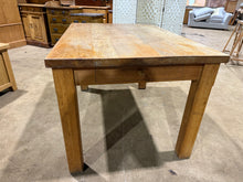 Load image into Gallery viewer, A sturdy oak dining table with authentic character, showing gentle signs of age and use. Features a single dovetail-jointed drawer ideal for storing cutlery. Comfortably accommodates four to six diners, making it perfect for family meals and entertaining. The solid construction ensures reliable everyday use, whilst the natural patina adds warmth to any dining space.

Delivery Available

Overall Dimensions

129cm long x 89cm wide x 77cm high
