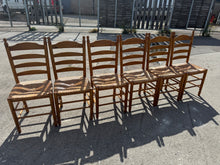 Load image into Gallery viewer, This charming set of 6 pine dining chairs are sturdy and in generally good shape. While they have some signs of use, the marks are minor and don’t take away from their overall appeal.

Delivery Available

Overall Dimensions

approx : 44cm wide x 40cm deep x 100cm high&nbsp;


