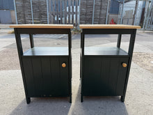 Load image into Gallery viewer, This charming pair of dark green bedside tables are sturdy and in decent condition overall. They show some signs of use, but a fresh coat of paint will easily refresh them. Each bedside features one shelf above a cupboard, providing handy storage space.

Overall Dimensions

46cm wide x 33cm deep x 70cm high

DELIVERY AVAILABLE      

For our other items see our website https://fossewayfurniture.co.uk

collection from our shop at cv36, our collection zone at bs36 or otherwise delivery is available

