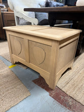 Load image into Gallery viewer, A characterful oak blanket box with solid construction and generous storage. This pre-loved piece shows honest wear—minor surface marks and a small crack to the back—adding to its vintage appeal. The stripped finish invites personalisation with wax or oil. Lift the lid to access spacious storage ideal for blankets, linens, or seasonal items. A practical and charming addition to any room.

Delivery Available

Overall Dimensions

79cm wide x 50cm deep x 52.5cm high&nbsp;


