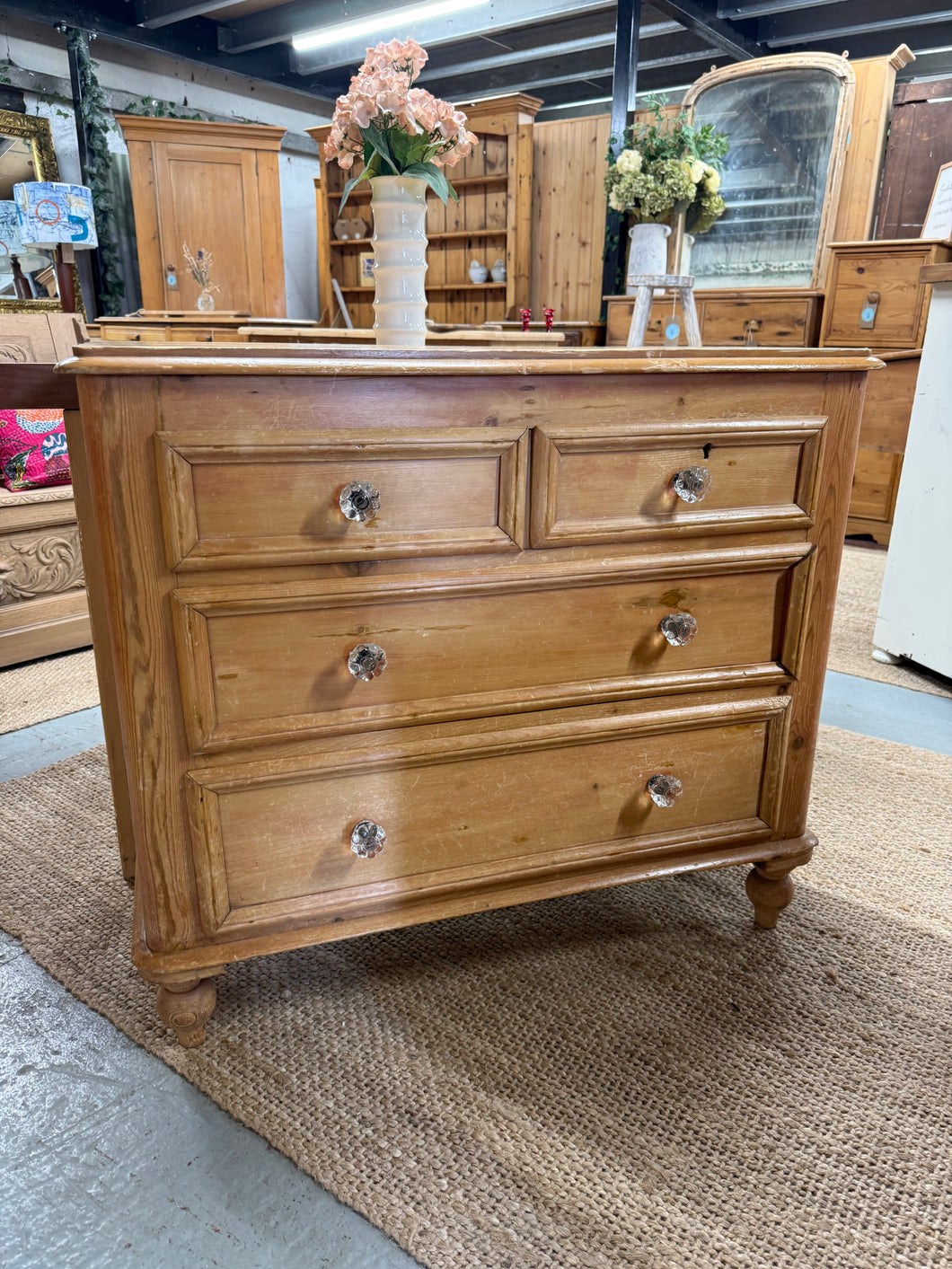 This charming vintage pine chest of drawers is sturdy and well-maintained. While it shows some signs of use with a few marks, these do not impact its functionality. It features two small dovetail jointed drawers above two larger ones, providing ample storage space.

Overall Dimensions

95cm wide x 46.5cm deep x 83.5cm high

DELIVERY AVAILABLE      

For our other items see our website https://fossewayfurniture.co.uk

collection from our shop at cv36, our collection zone at bs36 or otherwise delivery is avai