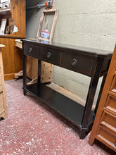 Load image into Gallery viewer, Elegant Oriental console table combining timeless design with practical storage. Features three compact drawers and a lower shelf, perfect for entryways, living rooms, or hallways. Shows gentle signs of use that enhance its character—structurally sound with authentic vintage appeal. Ideal for adding warmth and functionality to any interior.

Delivery Available

Overall Dimensions

109cm wide x 35cm deep x 81cm high]
