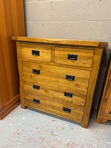 This beautiful oak chest of drawers from Oak Furniture Land is sturdy and in generally great shape. It shows some marks, mostly on the top, but these do not impact its functionality. The chest features two smaller dovetail-jointed drawers above three larger ones, combining style with practical storage.

Overall Dimensions

99cm wide x 43cm deep x 97cm high

DELIVERY AVAILABLE      

For our other items see our website https://fossewayfurniture.co.uk

collection from our shop at cv36, our collection zone at 