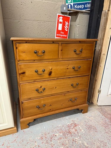 This beautiful solid pine chest of drawers is sturdy and in great overall shape. While it’s been used and shows a few minor marks, they don’t detract from its charm. Featuring two small dovetail-jointed drawers above three larger ones, it offers ample storage. Each drawer is adorned with elegant swan neck drop handles, adding a lovely touch to its timeless design.

Overall Dimensions

90.5cm wide x 47.5cm deep x 99.5cm high

DELIVERY AVAILABLE      

HAVE THIS PAINTED A COLOUR OF YOUR CHOICE FOR AN EXTRA £7
