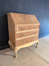 Load image into Gallery viewer, A characterful mahogany bureau, stripped to reveal its original finish. This vintage piece features three dovetail-jointed drawers beneath a pull-down writing desk, offering both storage and workspace. As a pre-loved item, it bears the patina of age with minor surface marks. The wood may benefit from a protective wax coat. One support arm requires minor attention.&nbsp;

Delivery Available

Overall Dimensions

74cm wide x 43.5cm deep x 97cm high

