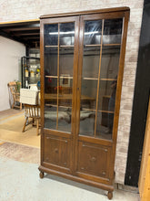 Load image into Gallery viewer, This beautiful oak bookcase is sturdy and well-maintained. While it shows some minor scratches, they don’t impact its functionality. Featuring five shelves for ample storage, it also includes a key for added security.

Overall Dimensions

91cm wide x 28cm deep x 191.5cm high

DELIVERY AVAILABLE      

HAVE THIS PAINTED A COLOUR OF YOUR CHOICE FOR AN EXTRA £80 OR HAVE IT COMPLETELY STRIPPED BACK FOR JUST £100    

For our other items see our website https://fossewayfurniture.co.uk

collection from our shop a
