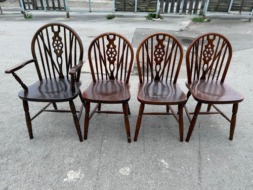 These well-built wheel-back dining chairs are in excellent condition and boast a striking wooden design. Though they may have minor marks, they are fully functional. The set includes 3 upright chairs and 1 carver chair.

Overall Dimensions

approx : 41cm wide x 48cm deep x 89cm high

DELIVERY AVAILABLE      

For our other items see our website https://fossewayfurniture.co.uk

collection from our shop at cv36, our collection zone at bs36
