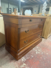 Load image into Gallery viewer, A handsome cherry wood chest of drawers in structurally sound condition. Features two short dovetail-jointed drawers above two generous long drawers, offering practical storage with traditional craftsmanship. Minor surface marks add character. Ideal for period properties and classic interiors seeking authentic wooden furniture with timeless appeal.

Delivery Available

Overall Dimensions

124cm wide x 51.5cm deep x 87cm high&nbsp;

