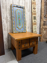 Load image into Gallery viewer, A charming solid wood lamp table with authentic rustic character. Structurally sound and fully functional, this piece showcases the natural patina of age with minimal wear. Features a dovetail-jointed drawer providing practical storage for books, or accessories. Perfect for adding warmth and vintage appeal to a bedroom, hallway, or living space.

Delivery Available

Overall Dimensions

61cm wide x 60.5cm deep x 46cm high

