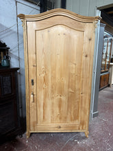 Load image into Gallery viewer, This charming antique pine wardrobe combines timeless character with practical functionality. Structurally sound and well-preserved, it showcases authentic age-related patina that enhances its vintage appeal. The interior features a single hanging rail, perfect for storing garments, and comes complete with its original key. An ideal statement piece for period homes or anyone seeking genuine vintage furniture with heritage charm.

Delivery Available

Overall Dimensions

107cm wide x 53cm deep x 180.5cm high&amp;
