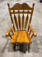 Load image into Gallery viewer, A charming solid pine rocking chair with authentic farmhouse character. This well-loved piece shows its age with minor surface marks, yet remains structurally solid and ready for years of use. Ideal for creating a cosy fireside retreat or adding rustic appeal to any room.&nbsp;

Delivery Available

Overall Dimensions

65cm wide x 115cm high / 48cm seat height&nbsp;

