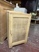 Load image into Gallery viewer, Restored to bare wood, this charming pot cupboard reveals its natural character and grain. We recommend applying wax to protect the finish and enhance its appearance. The interior features three adjustable shelves, offering flexible storage solutions for your kitchen essentials.

Delivery Available

Overall Dimensions

46cm wide x 33cm deep x 80cm high
