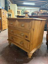 Load image into Gallery viewer, This charming vintage pine bedside table combines authentic character with practical storage. Two short dovetail-jointed drawers sit above two generous long drawers, offering ample space for bedside essentials. Structurally sound and well-maintained, it bears the gentle patina of age—minor marks that add to its vintage appeal rather than detract from it. A timeless piece that brings warmth and functionality to any bedroom.

Delivery Available

Overall Dimensions

72cm wide x 50cm deep x 65cm high

