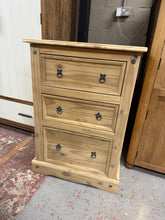 Load image into Gallery viewer, This beautiful pine chest of drawers has been fully stripped to reveal its natural finish and could use a wax coating to help protect it. It features three spacious drawers, perfect for storing your belongings.

Delivery Available

Overall Dimensions

72cm wide x 48.5cm deep x 105cm high

