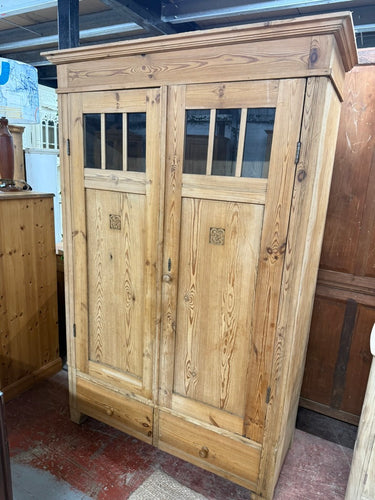 This beautiful antique pine wardrobe is solidly built and remains in good condition considering its age. While it shows some signs of use and a missing piece of trim on one side, this doesn't impact its functionality. A polish would brighten the surface and reduce minor marks. It offers generous storage with a hanging rail and two dovetail-jointed drawers. Plus, it fully dismantles for easy transportation.

Overall Dimensions

124.5cm wide x 56.5cm deep x 189.5cm high

DELIVERY AVAILABLE      

For our othe