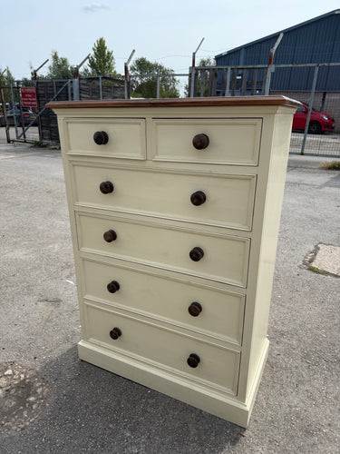 This beautiful tall chest of drawers is crafted from solid pine and showcases a charming two-tone finish. The top and knobs are finished in a rich deep brown, while the body is painted in a soft off-cream shade. As a pre-loved piece, it shows some marks that could be refreshed with a little touch-up. It offers practical storage with two short dovetail jointed drawers above four longer ones.

Overall Dimensions

86cm wide x 45cm deep x 120cm high

DELIVERY AVAILABLE      

For our other items see our website