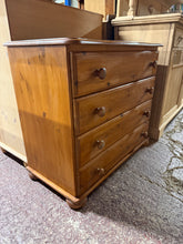 Load image into Gallery viewer, A charming pine chest of drawers offering practical storage with timeless appeal. This well-maintained piece features four generous drawers, ideal for organising bedroom essentials or living spaces. Crafted from quality pine, it shows authentic character from gentle use. Perfect for those seeking vintage charm without compromise on functionality.

Delivery Available

Overall Dimensions

85cm wide x 44cm deep x 74.5cm high


