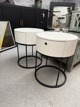 Load image into Gallery viewer, A stylish pair of modern bedside tables, both in sound structural condition with minor cosmetic wear consistent with pre-loved furniture. Each unit features a practical drawer for storage, offering functional elegance for the bedroom. Ideal for those seeking authentic, characterful pieces.

Delivery Available

Overall Dimensions

40cm diameter x 51cm high&nbsp;

