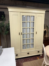 Load image into Gallery viewer, This charming antique pine wardrobe combines practical storage with timeless character. Structurally sound and in good overall condition, it features one double and one single cupboard, each with a hanging rail, plus a long dovetail-jointed drawer below. The piece shows honest signs of age and use—minor marks that add to its authentic appeal. Fully dismantlable for easy transport and repositioning, it's an ideal choice for those seeking vintage furniture with genuine craftsmanship and functionality.

Delive
