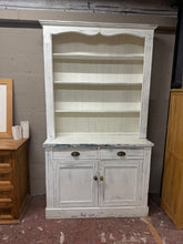 Load image into Gallery viewer, This durable distressed wooden dresser is in overall good condition and has a charming rustic appearance. It features ample storage space, including 3 top shelves above 2 dovetail jointed drawers, a double cupboard, and a shelf in the base. It also easily splits into two pieces for convenient moving.

Overall Dimensions

121cm wide x 47.5cm deep x 218cm high

DELIVERY AVAILABLE    

For our other items see our website https://fossewayfurniture.co.uk

collection from cv36 or delivery available 

