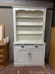 This durable distressed wooden dresser is in overall good condition and has a charming rustic appearance. It features ample storage space, including 3 top shelves above 2 dovetail jointed drawers, a double cupboard, and a shelf in the base. It also easily splits into two pieces for convenient moving.

Overall Dimensions

121cm wide x 47.5cm deep x 218cm high

DELIVERY AVAILABLE    

For our other items see our website https://fossewayfurniture.co.uk

collection from cv36 or delivery available 
