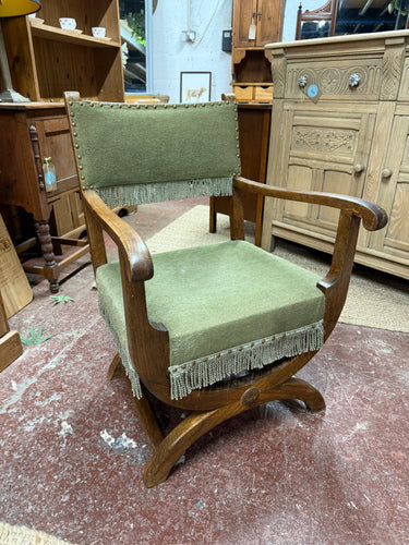This beautiful emerald green armchair is solidly built and generally well maintained. While it shows some signs of use with minor marks or damage, nothing is significant. The front legs feature a charming cross-branded design, adding a lovely elegant detail.

Delivery Available

Overall Dimensions

approx : 55cm wide x 54cm deep x 80cm high
