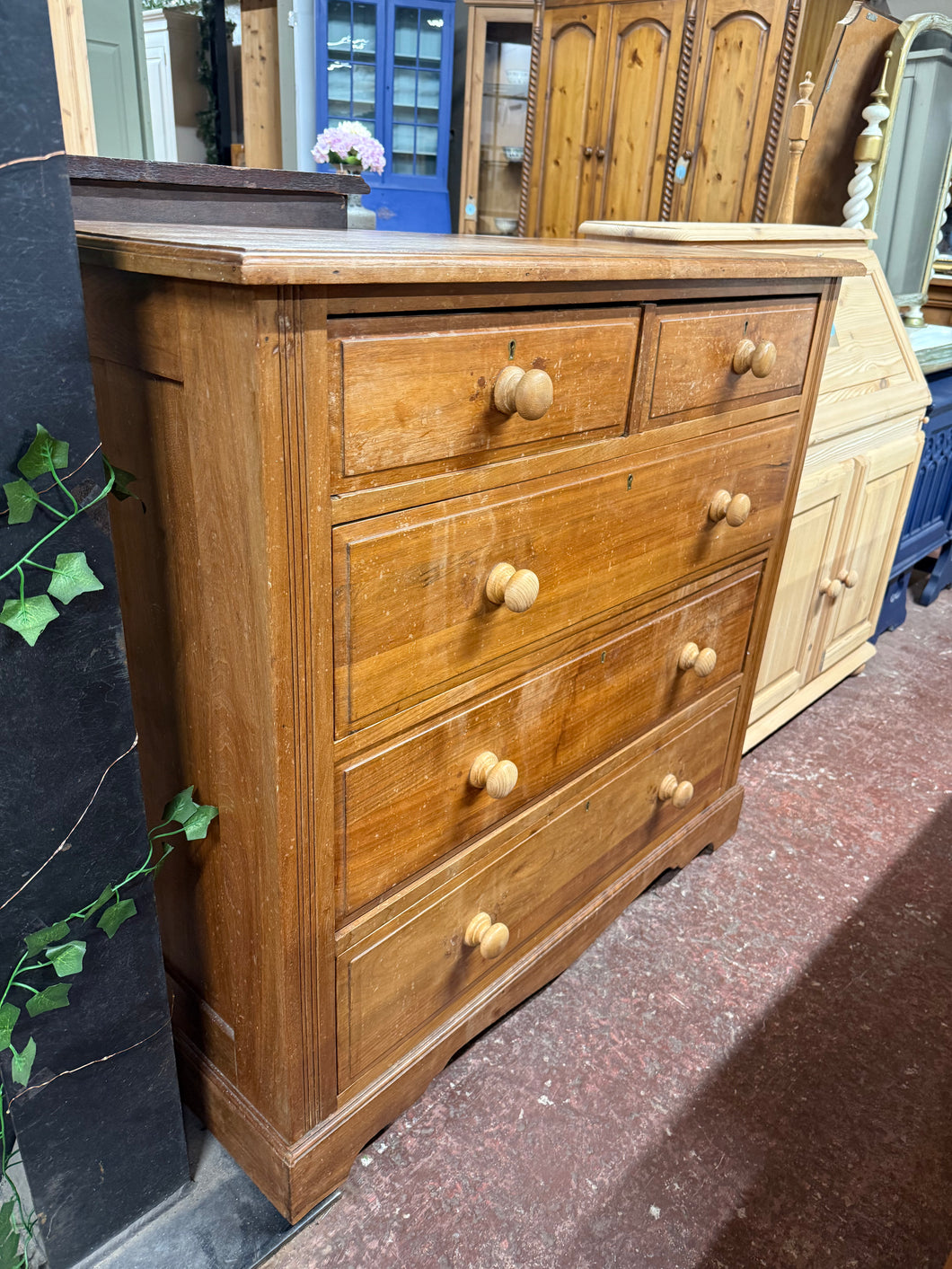 This charming pine chest of drawers is sturdy and generally well-maintained. While it shows some signs of use, a bit of care will restore it to near-new condition. It features two small dovetail-jointed drawers above three longer ones, offering plenty of storage space.

Overall Dimensions

103cm wide x 49.5cm deep x 100cm high

DELIVERY AVAILABLE      

HAVE THIS PAINTED A COLOUR OF YOUR CHOICE FOR AN EXTRA £80 OR HAVE IT COMPLETELY STRIPPED BACK FOR JUST £90    

For our other items see our website https:/