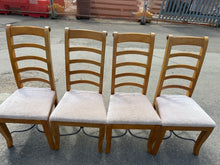 Load image into Gallery viewer, A set of four dining chairs believed to be Barker &amp; Stonehouse by brand. Each piece showcases natural patina and minor surface marks that speak to their age and quality craftsmanship. Ideal for creating an established, characterful dining setting. View in store or arrange delivery to your home.

Delivery Available

Overall Dimensions

approx : 50cm wide x 43cm deep x 111cm high

