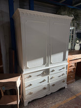 Load image into Gallery viewer, A beautiful mahogany linen press finished in Farrow &amp; Ball's elegant Shadow White, offering both style and practicality. This well-crafted piece features six dovetail-jointed drawers and a spacious double cupboard with two internal shelves, providing ample storage for linens and household essentials. Structurally sound with minor cosmetic imperfections that are readily repairable, it's a wonderful addition to any home. The two-part design makes transportation and placement effortless, so you can enjoy this 
